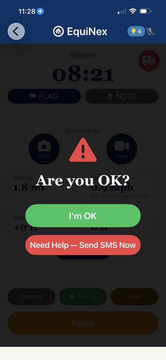 EquiNex fall alarm during a ride: Are you OK? with I'm OK and Need Help buttons